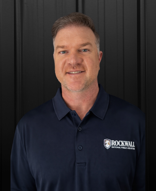 Jeff Knutson, Public Adjuster at Rockwall National Public Adjusters, wearing a navy polo with the company logo, against a black background.