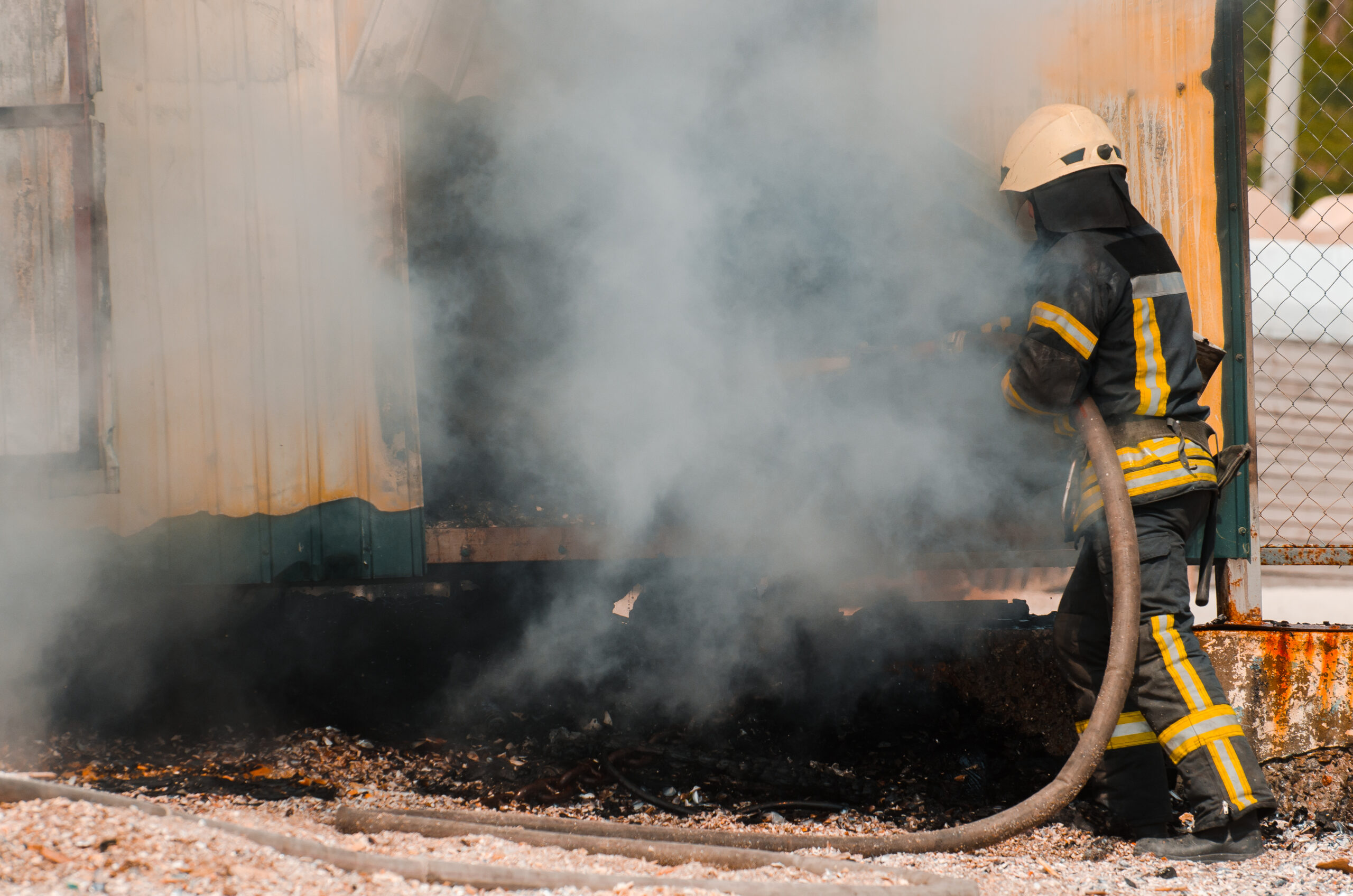 fireman extinguishes fire.The concept of saving people in a fire